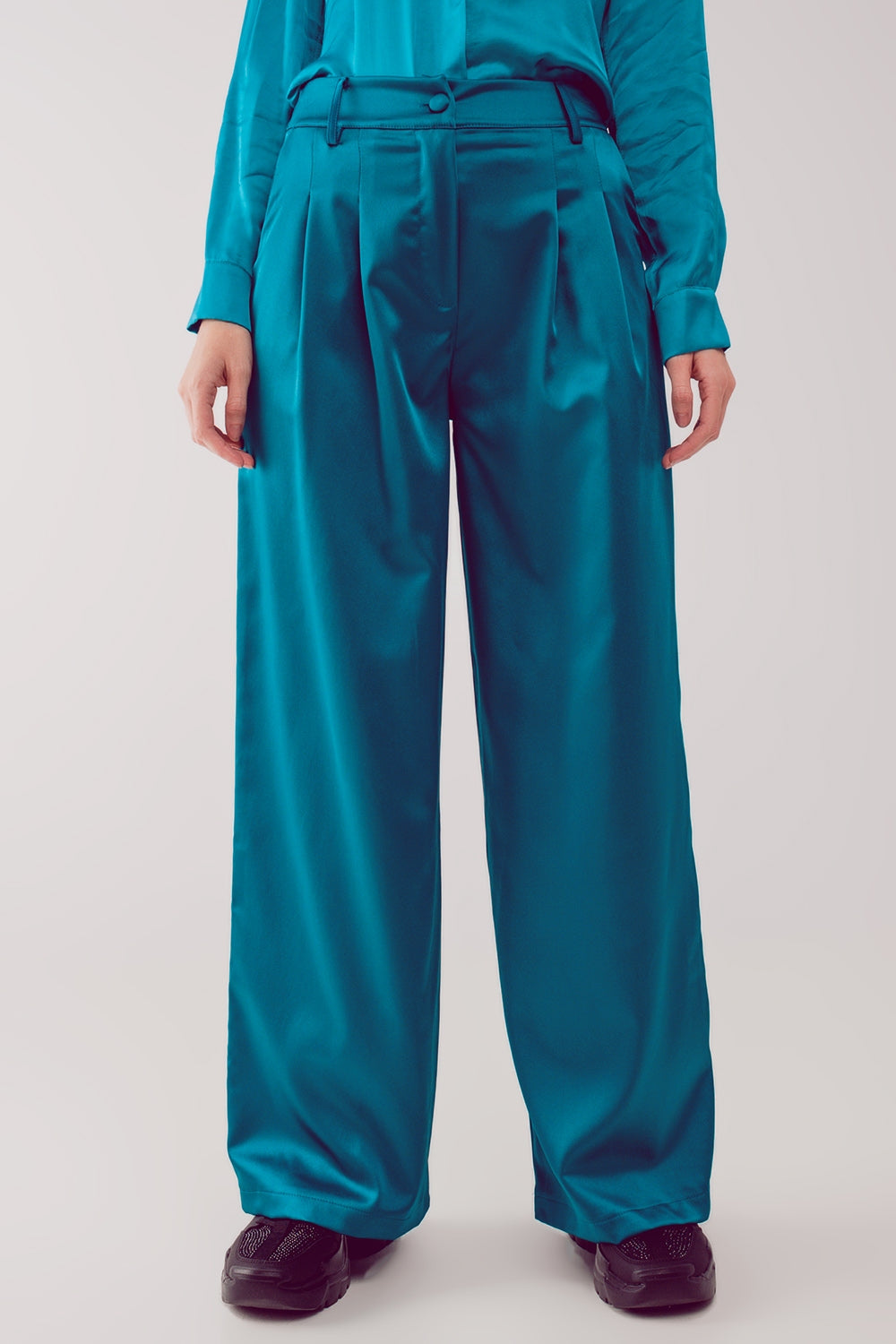 Pantalones palazzo con pinzas en turquesa