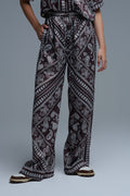 Pantalones relajados con estampado de cachemira y cordón ajustable en marrón