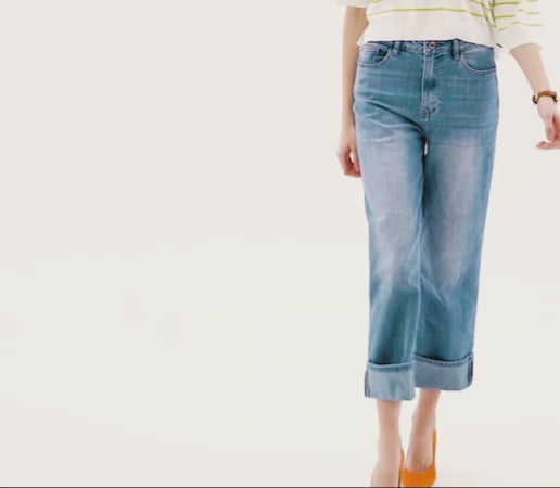 Vaqueros azul medio con dobladillo vuelto