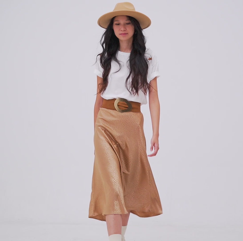 Falda midi con estampado abstracto animal dorada