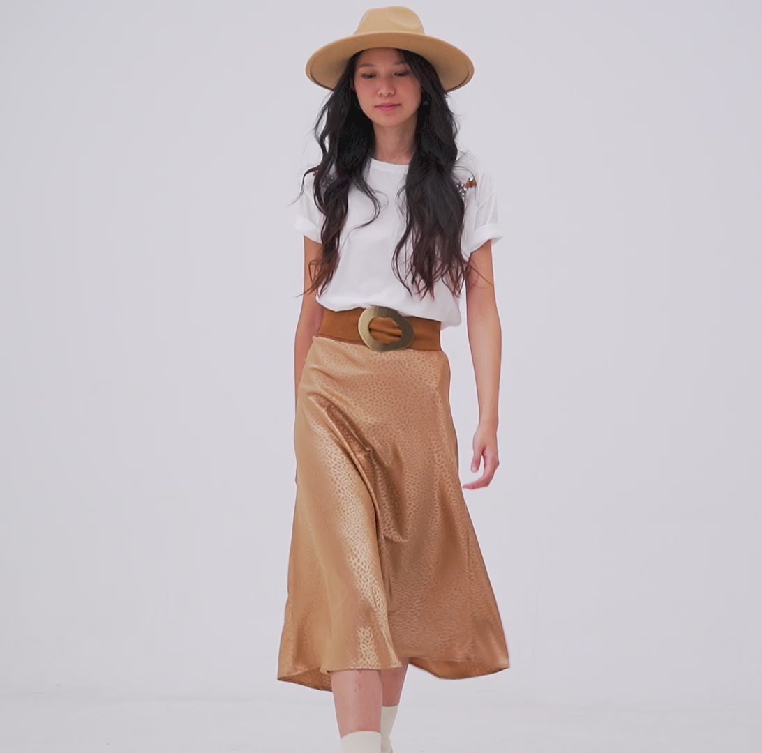 Falda midi con estampado abstracto animal dorada