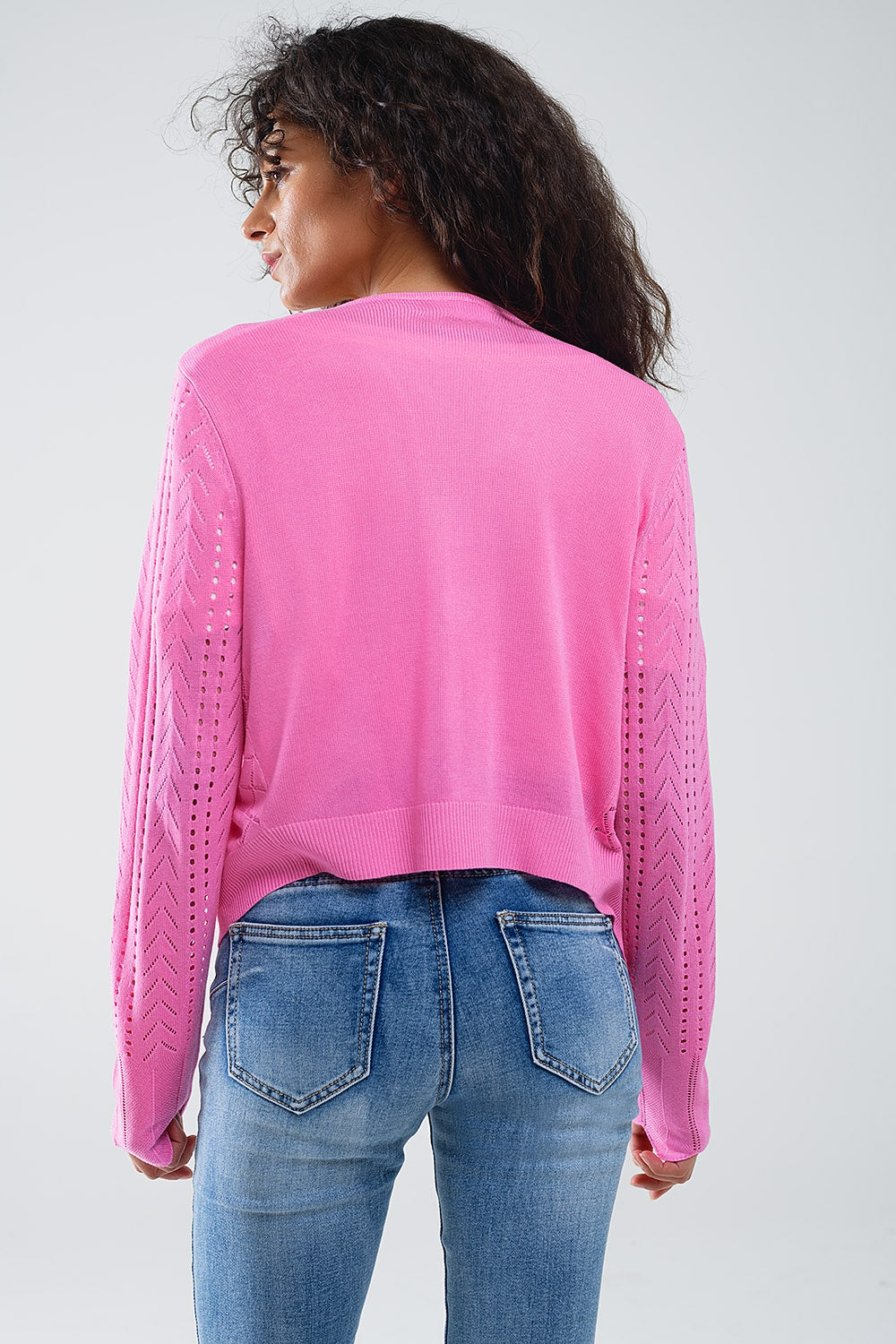 Rebeca rosa con estampado de rombos y cierre de lazo