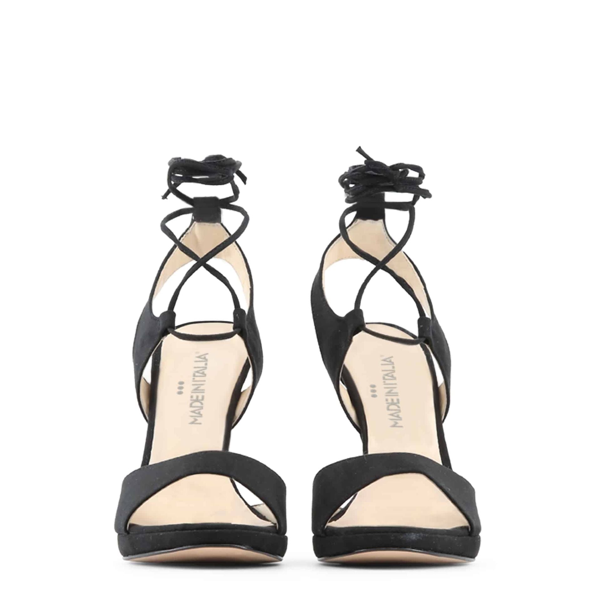Sandalias negras con tacón alto y lazada cruzada
