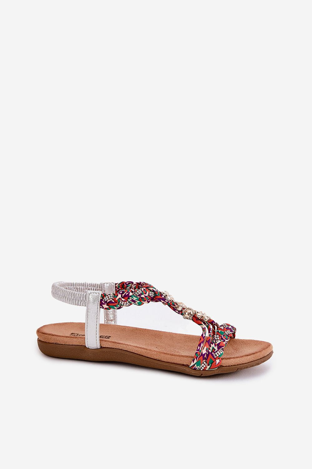 Sandalias multicolor con flores metálicas sobre fondo blanco
