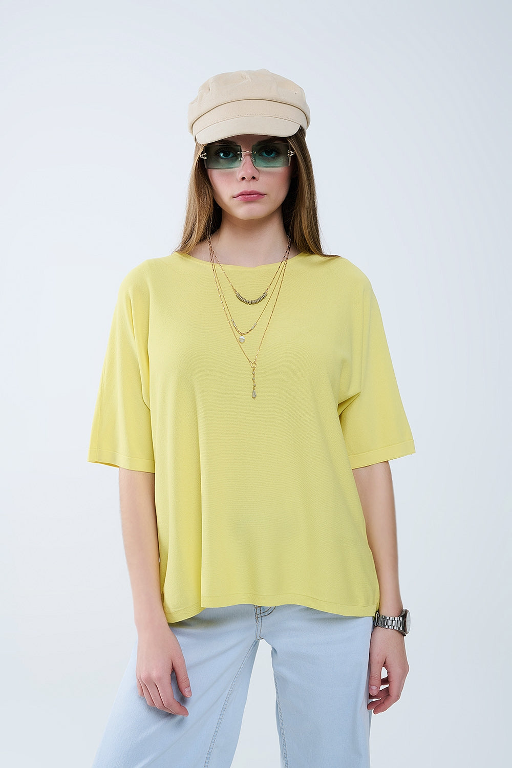 Suéter amarillo oversize con mangas hasta el codo