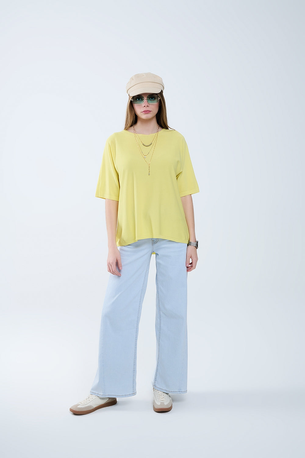 Suéter amarillo oversize con mangas hasta el codo