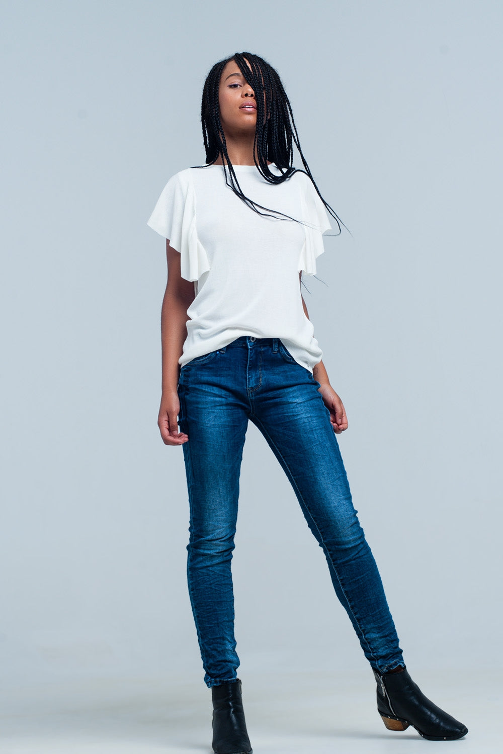 Sueter blanco con volantes