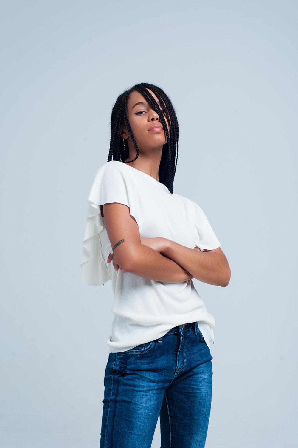 Sueter blanco con volantes