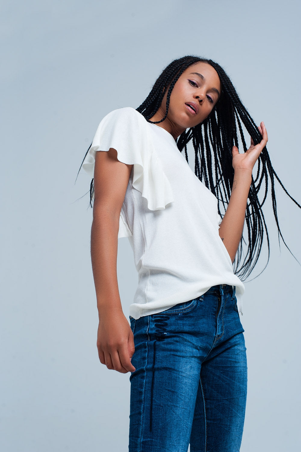 Sueter blanco con volantes
