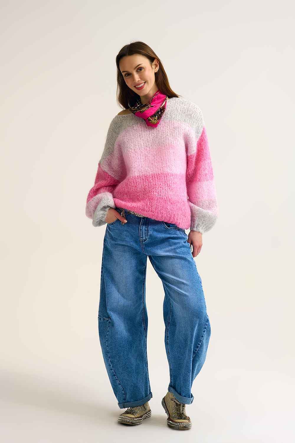 Sueter de punto degradado con suaves transiciones de color rosa