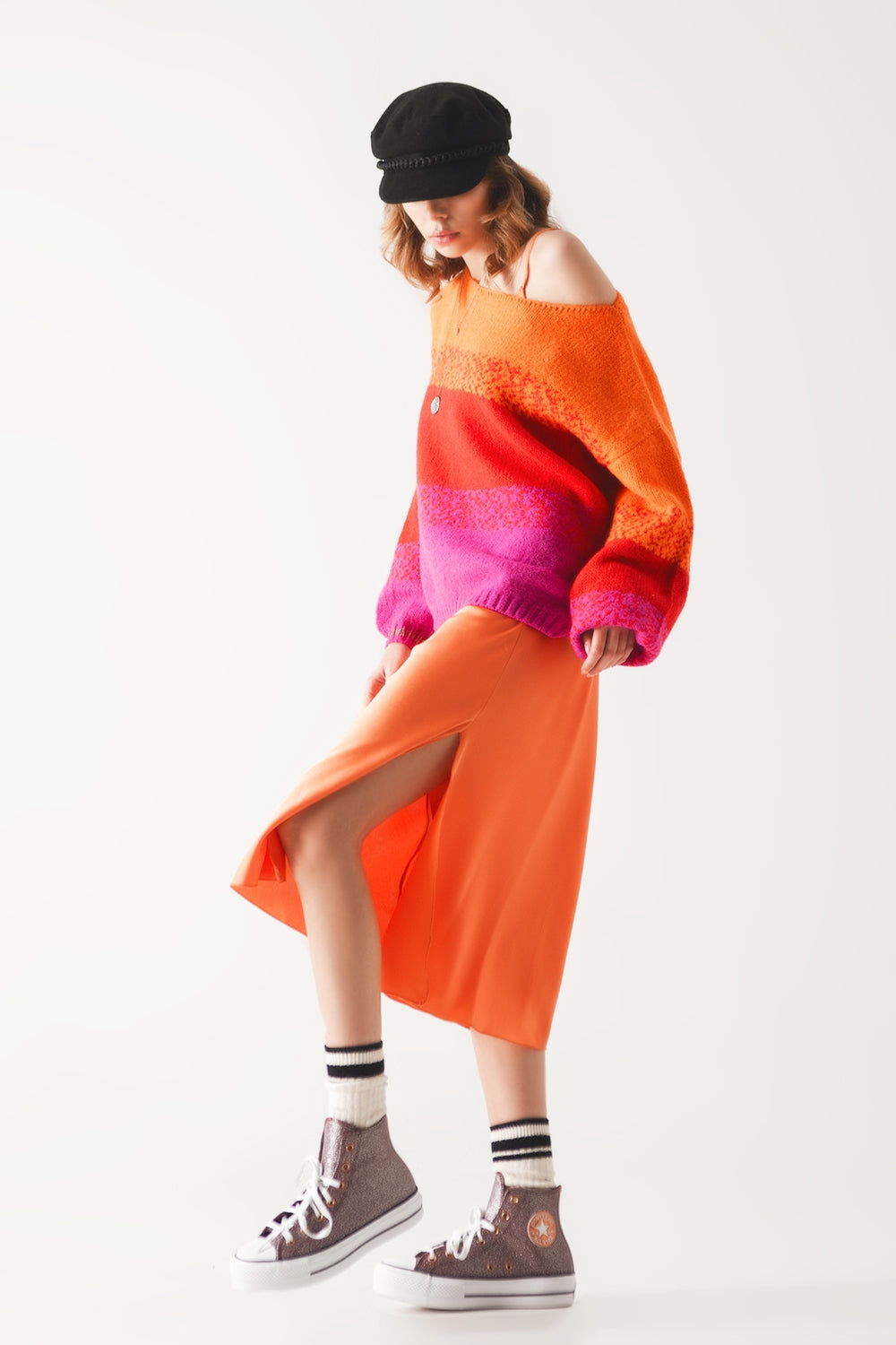 Suéter de punto naranja con rayas mélange