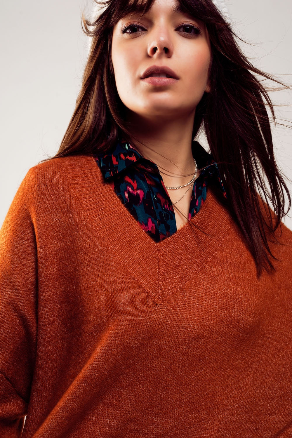 Sueter vestido de pico extragrande en color naranja