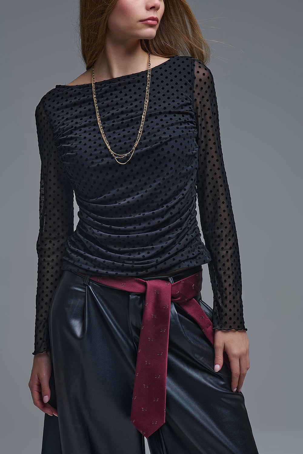 Top negro de lunares transparentes