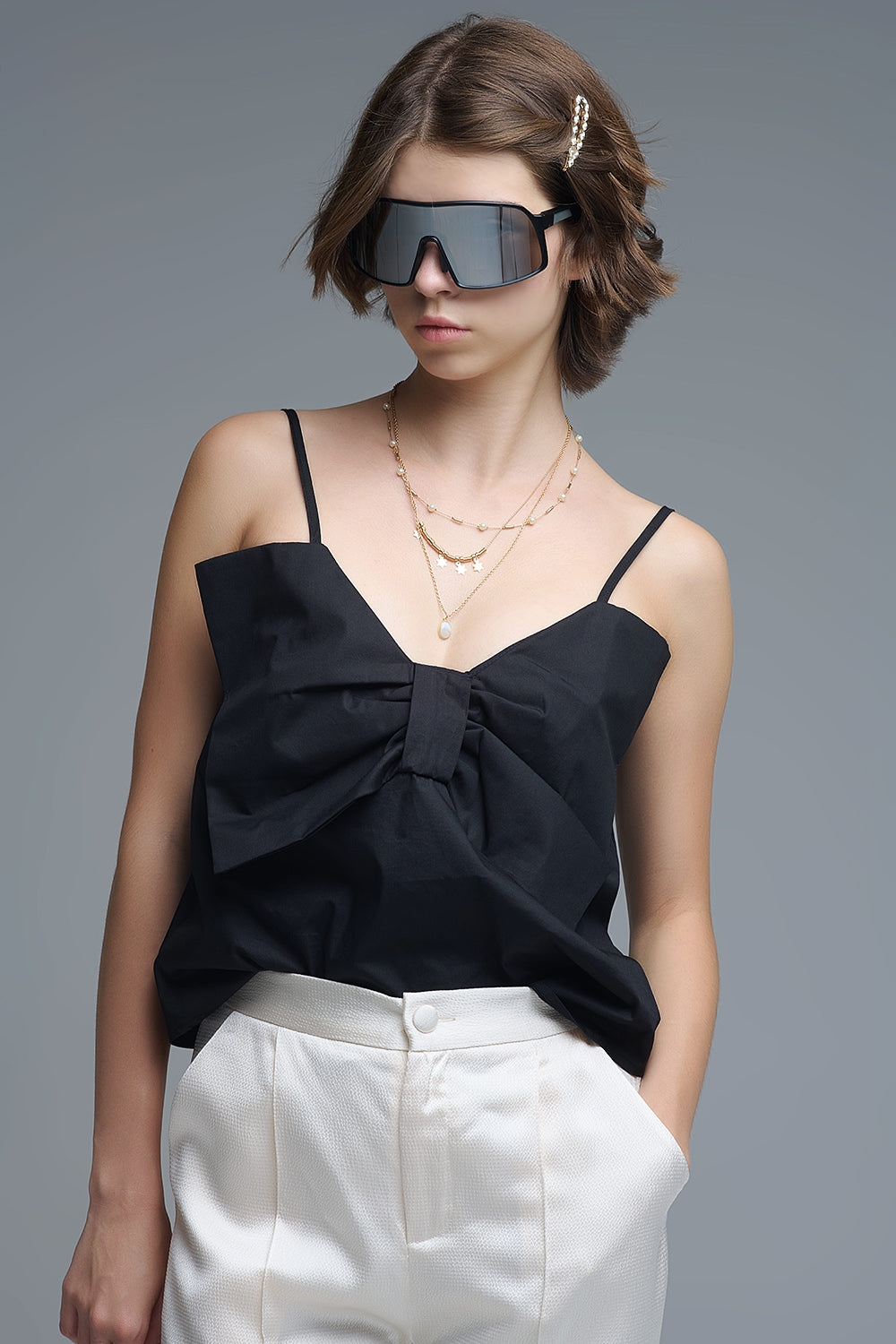 Top negro de popelina con detalle de lazo