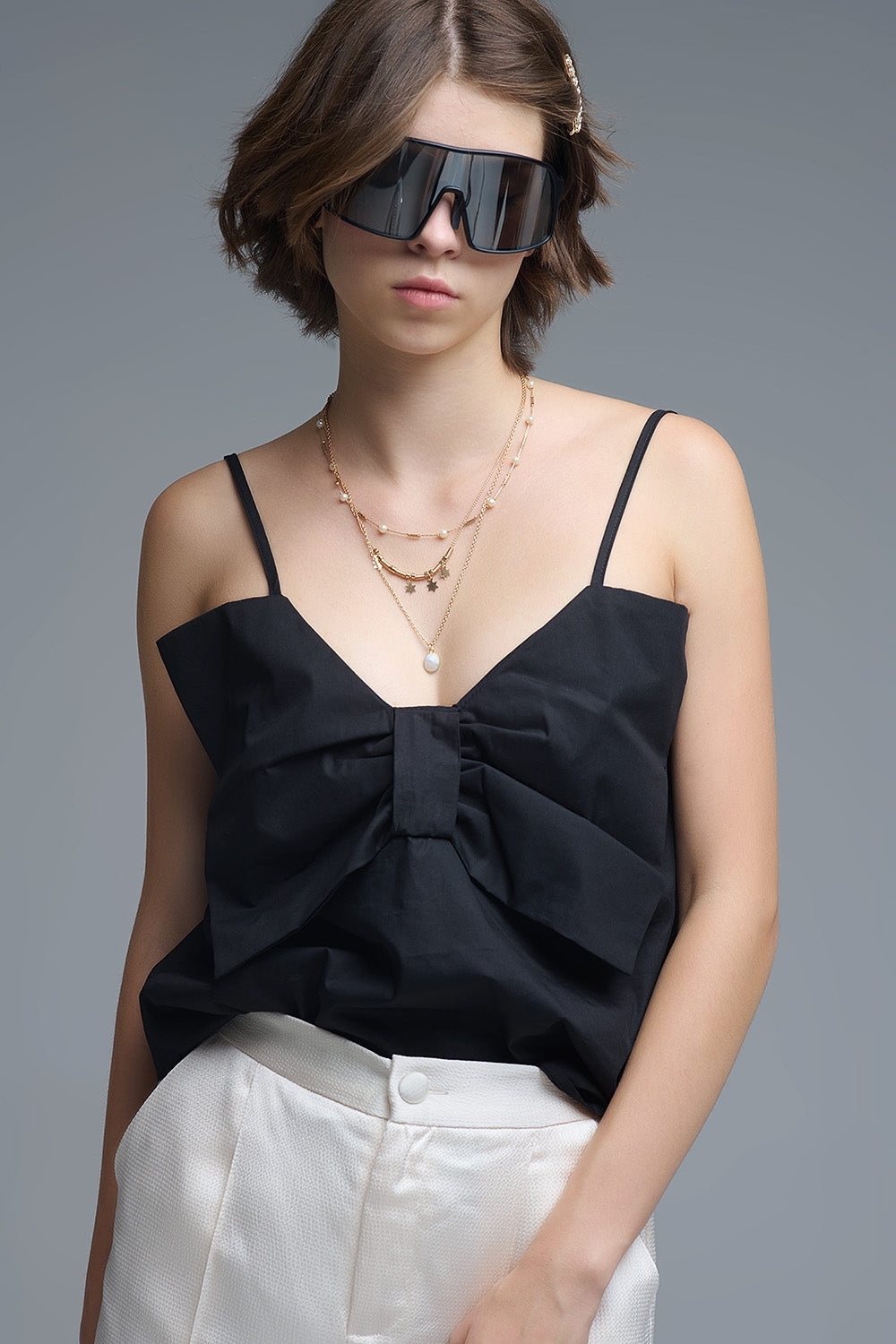 Top negro de popelina con detalle de lazo