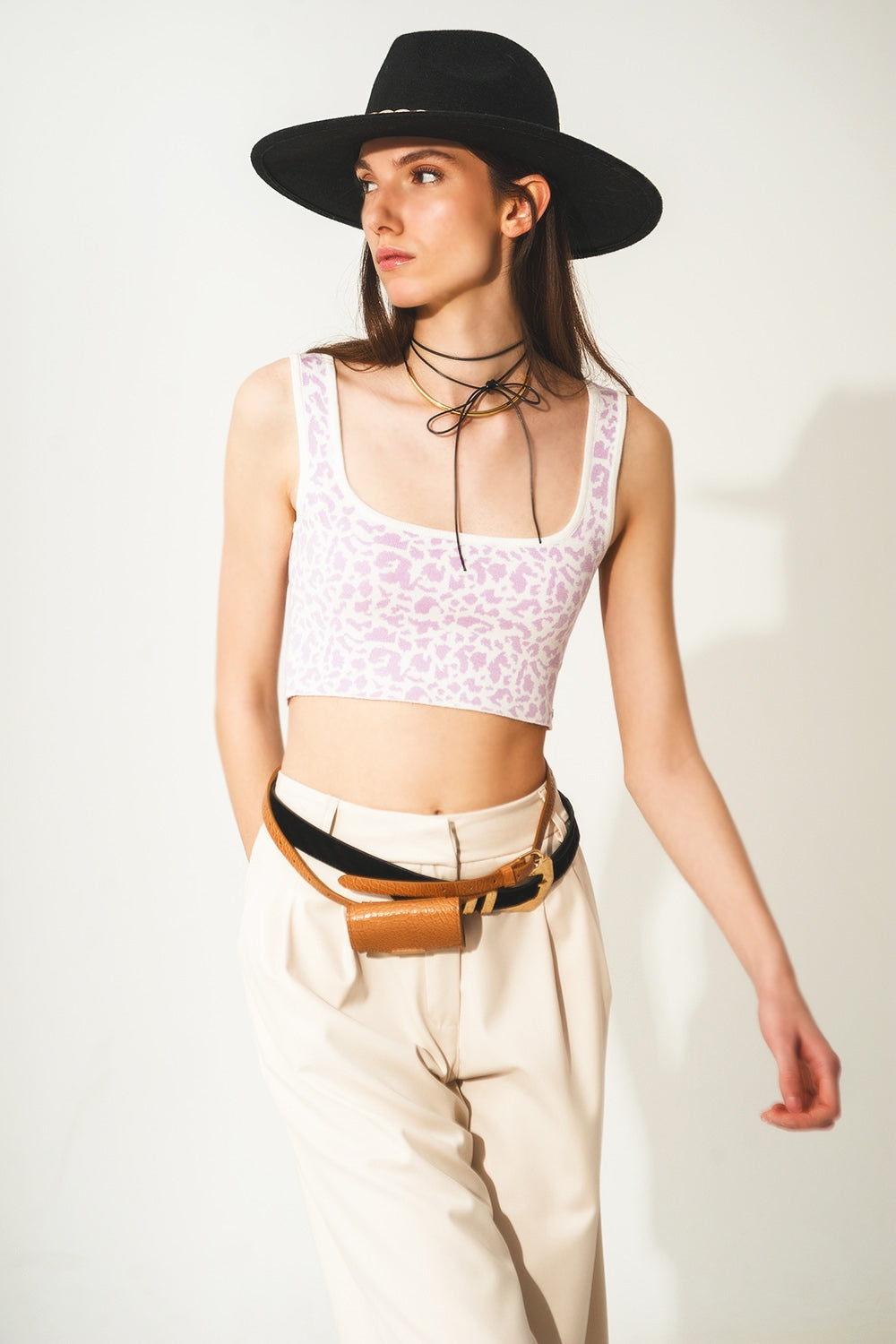 Top punto ligero en estampado animal lila