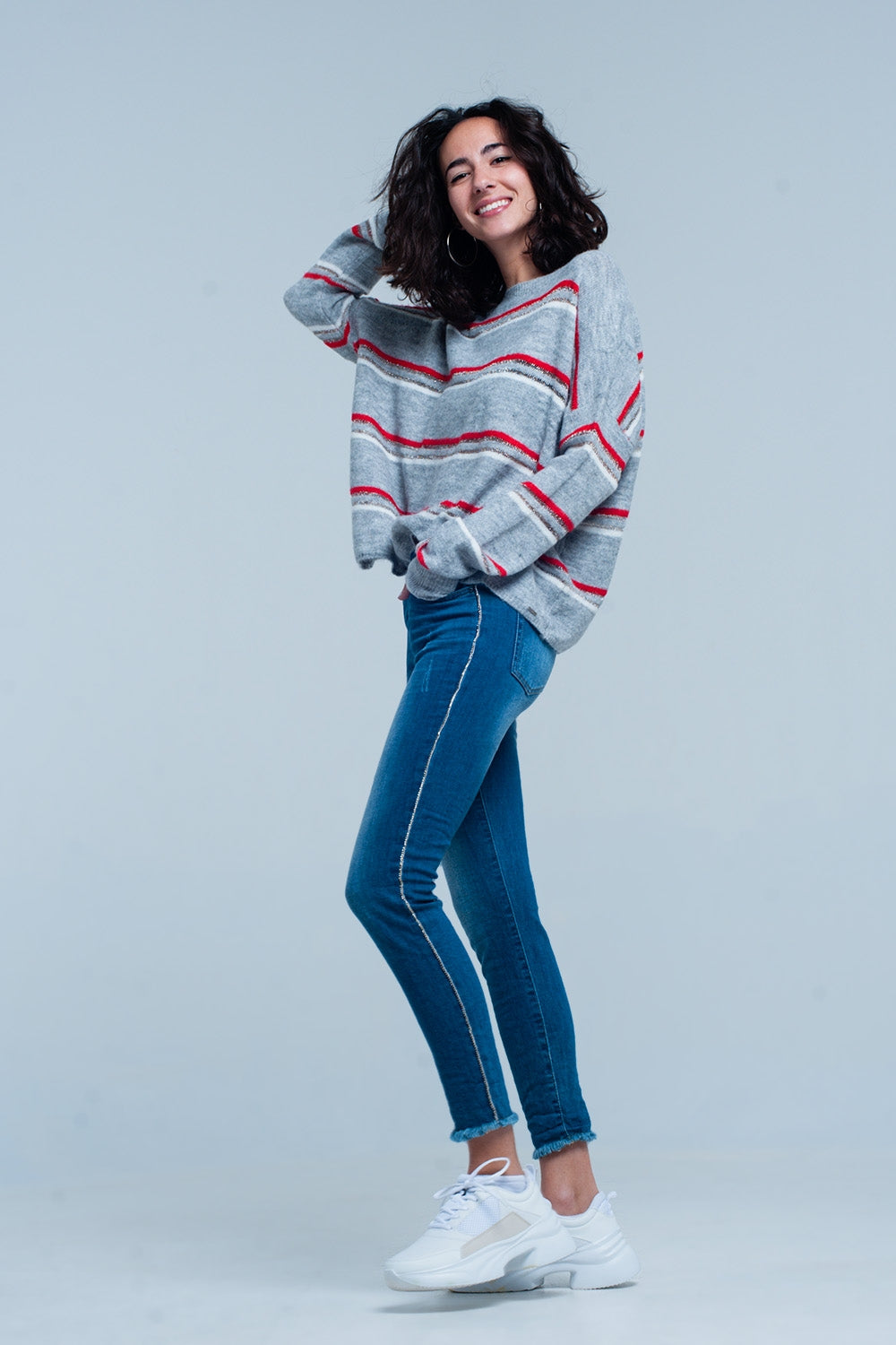 Vaquero pitillo con flecos y rayas laterales de strass