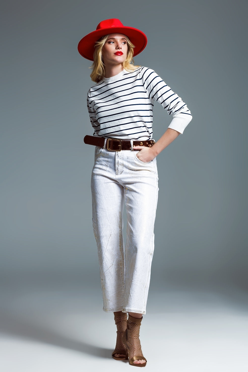 Vaqueros blancos de pata ancha con acabado metalizado en dorado