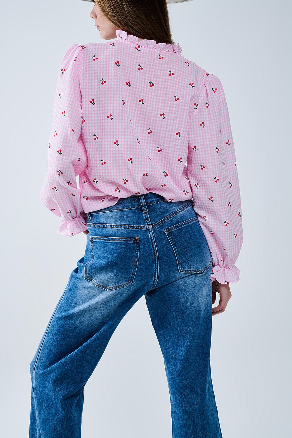 Vaqueros de corte recto con dobladillo y puños en lavado medio