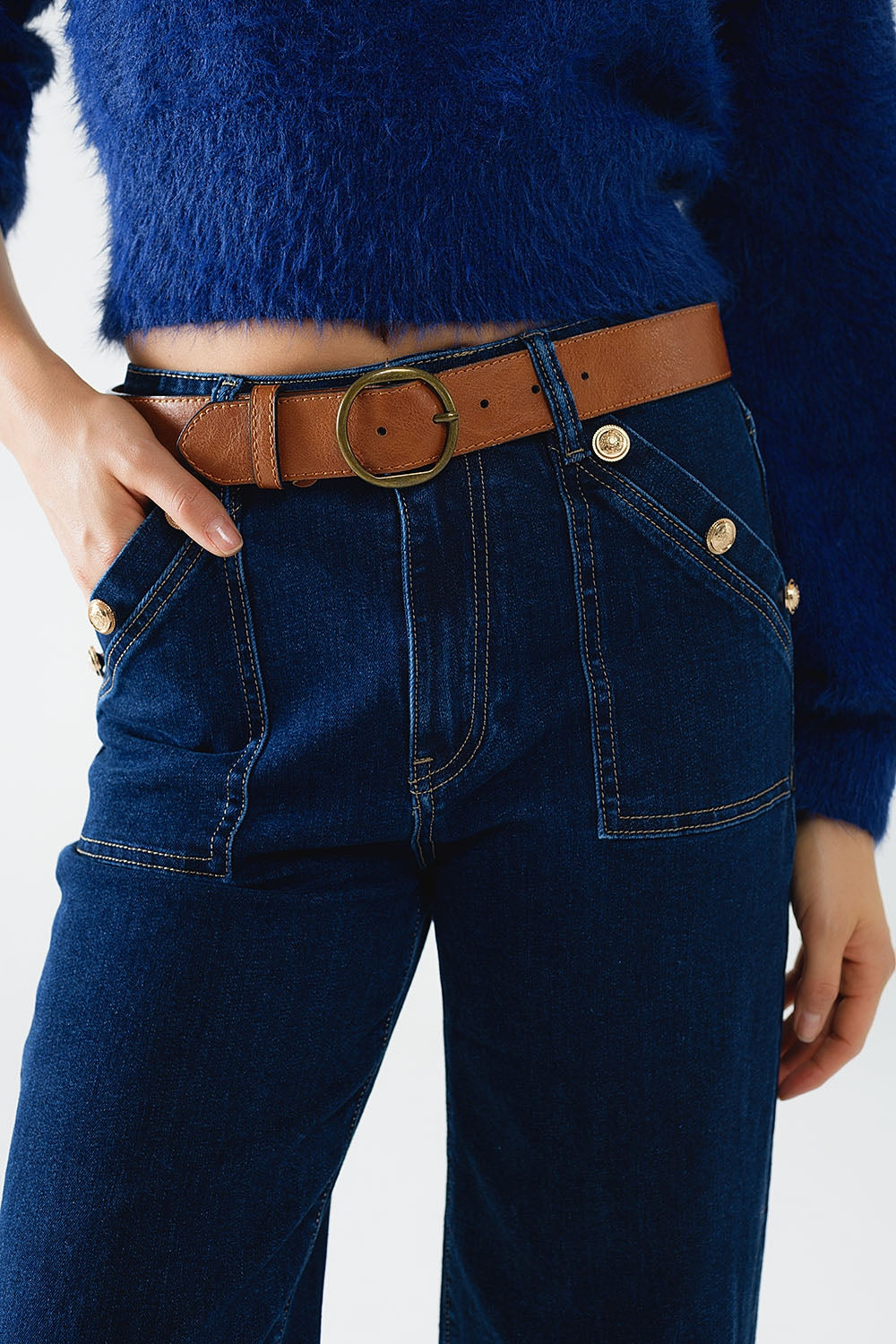 Vaqueros de pernera ancha con detalle de botones