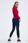 Pantalón vaquero pitillo de mujer en color negro, corte ajustado elástico con bolsillos funcionales.