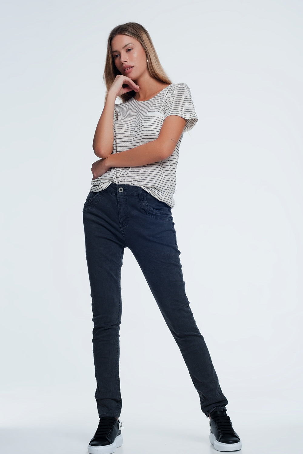 Vaqueros gris de tiro caído