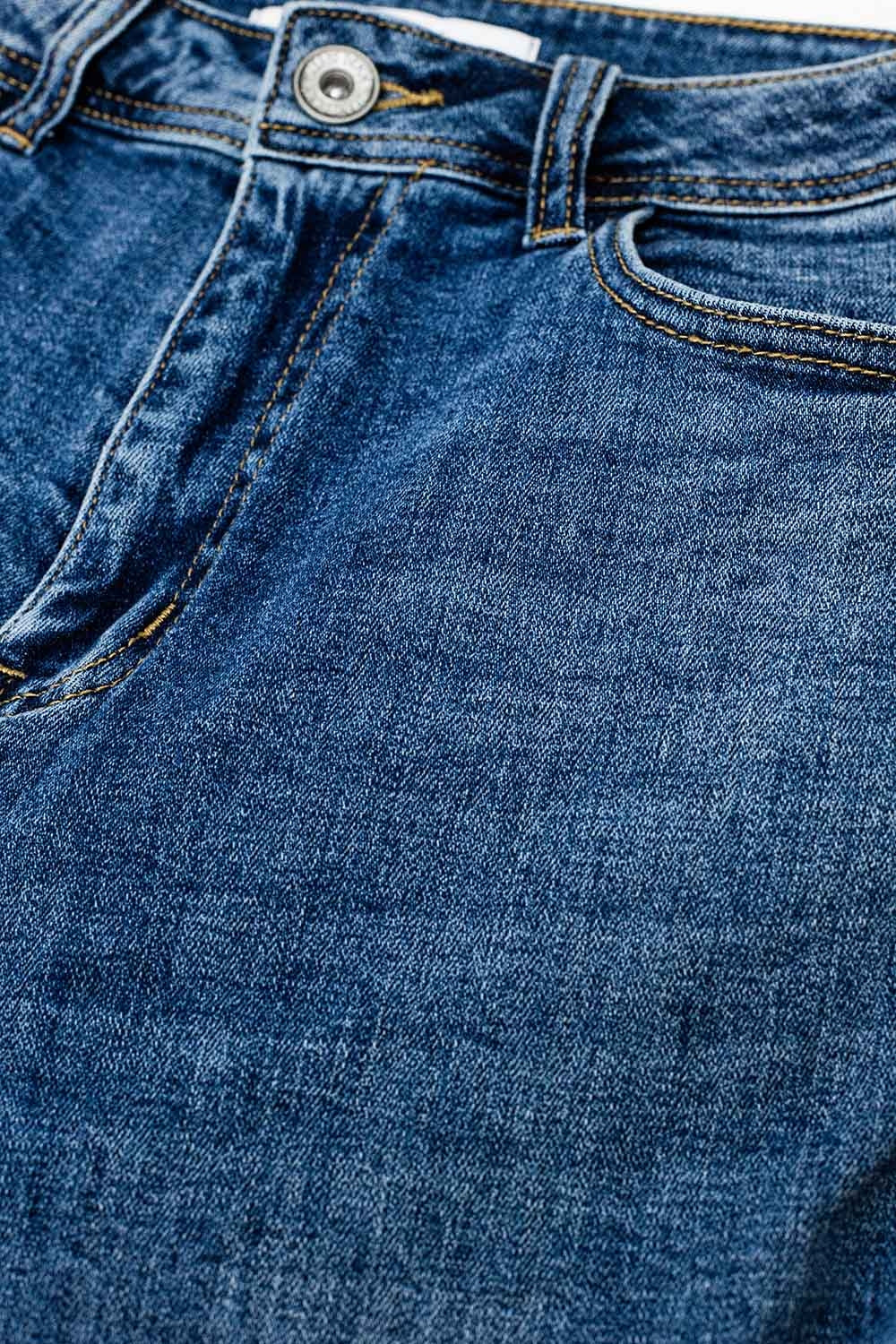 Vaqueros pitillo elásticos con cinco bolsillos en lavado oscuro