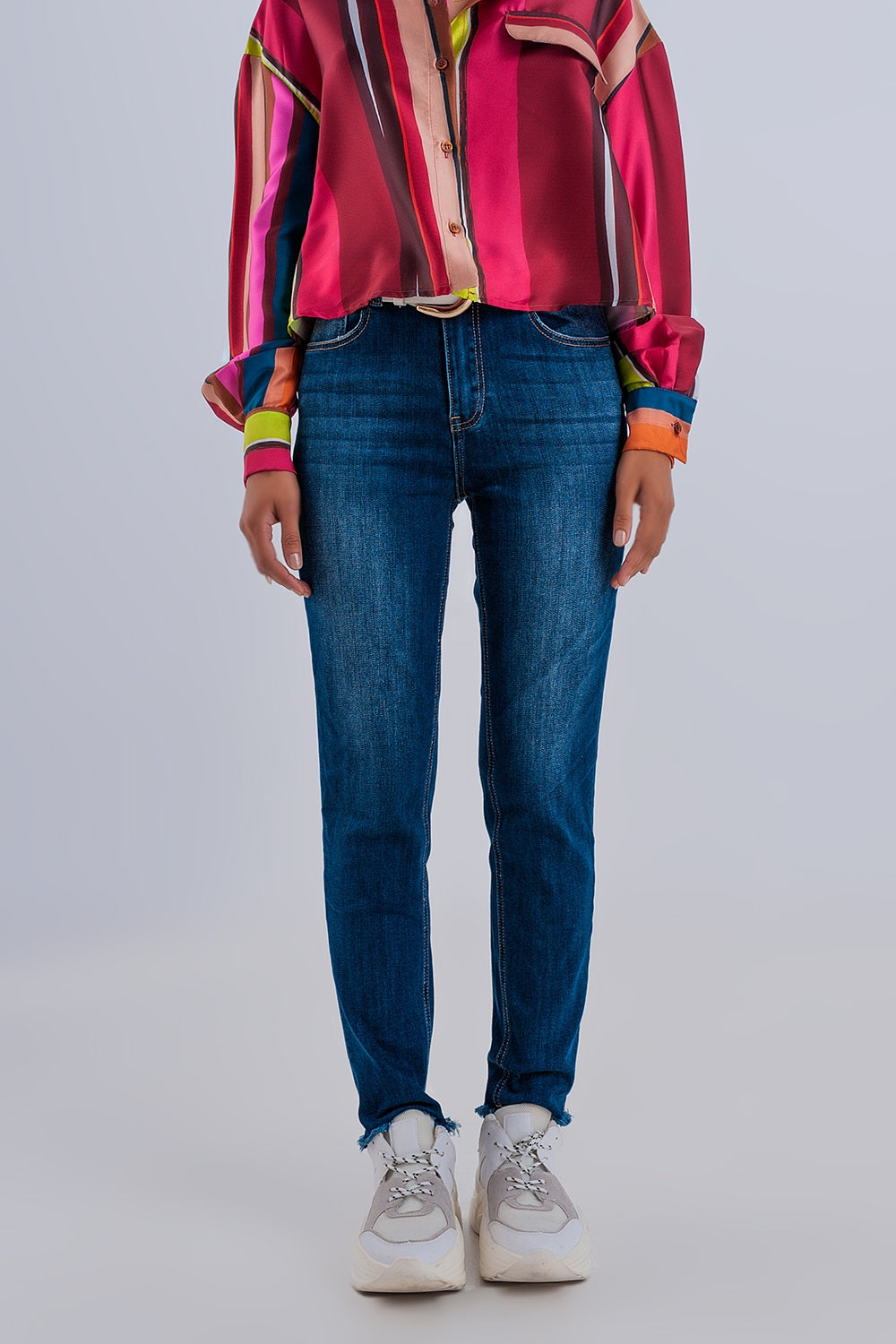 Vaqueros skinny de cintura alta con bajos sin rematar en azul oscuro