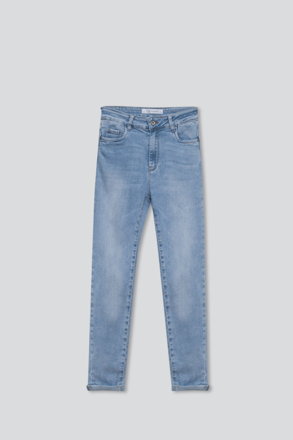 Vaqueros super pitillo de cintura regular en lavado claro con 5 bolsillos