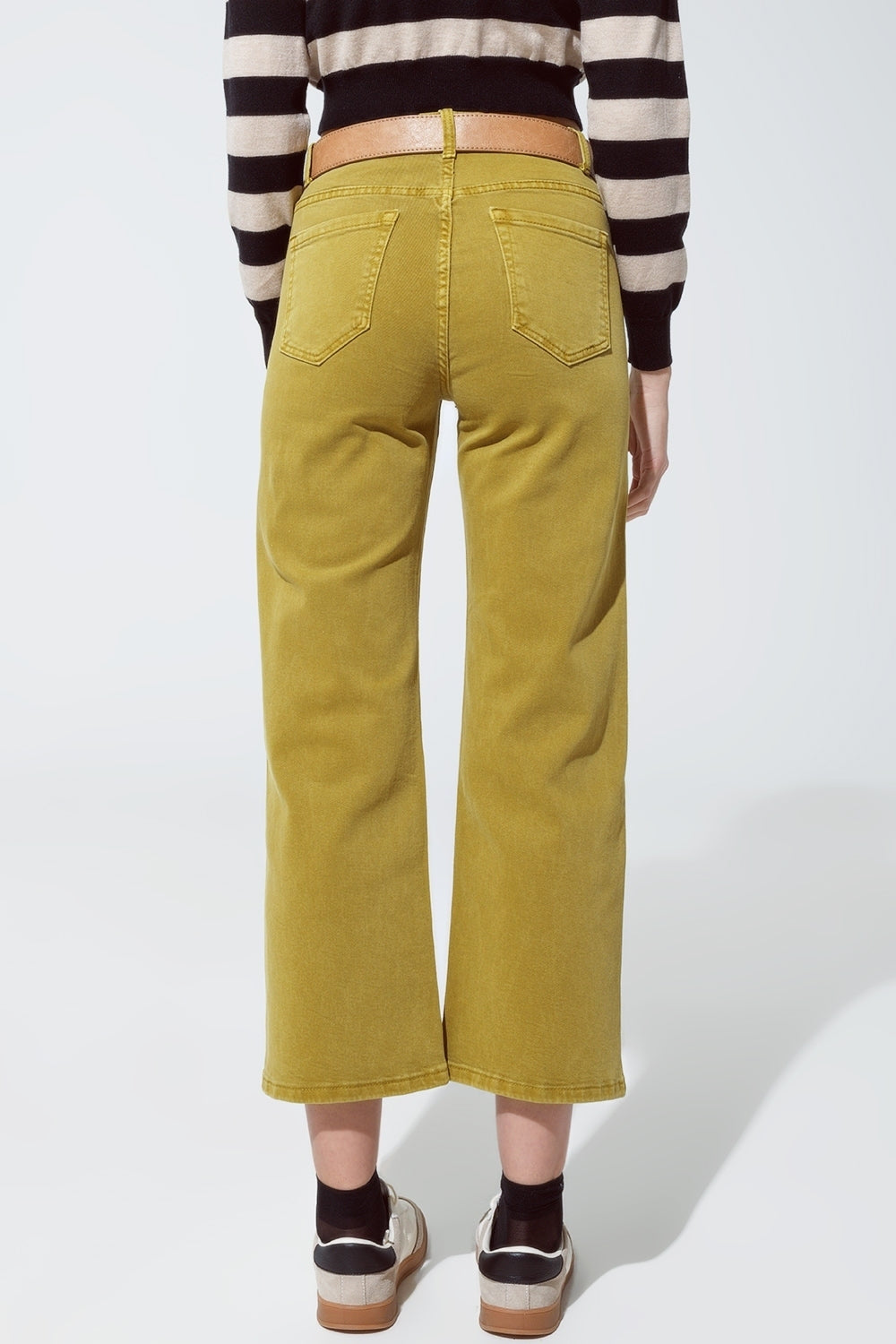 Vaqueros verdes de pierna recta con brillo metálico dorado