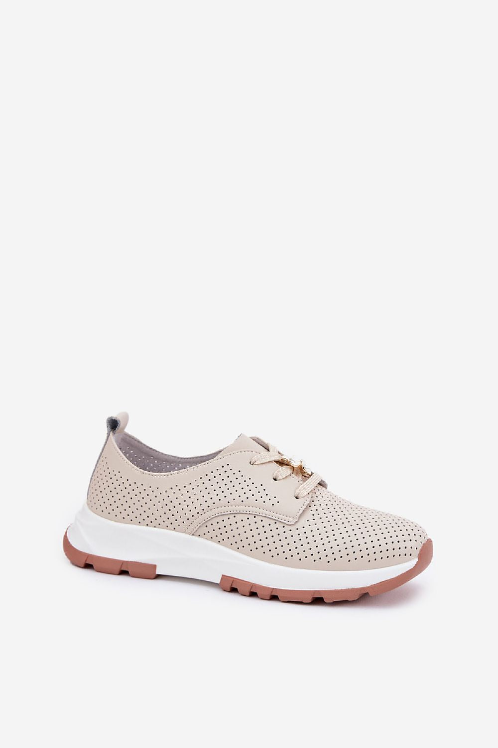 Zapatillas beige deportivas con plataforma blanca, perfil lateral
